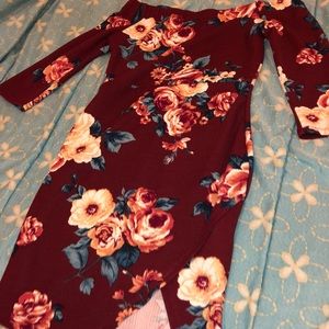 a burgundy dress with pretty flowers on it 🥰😂